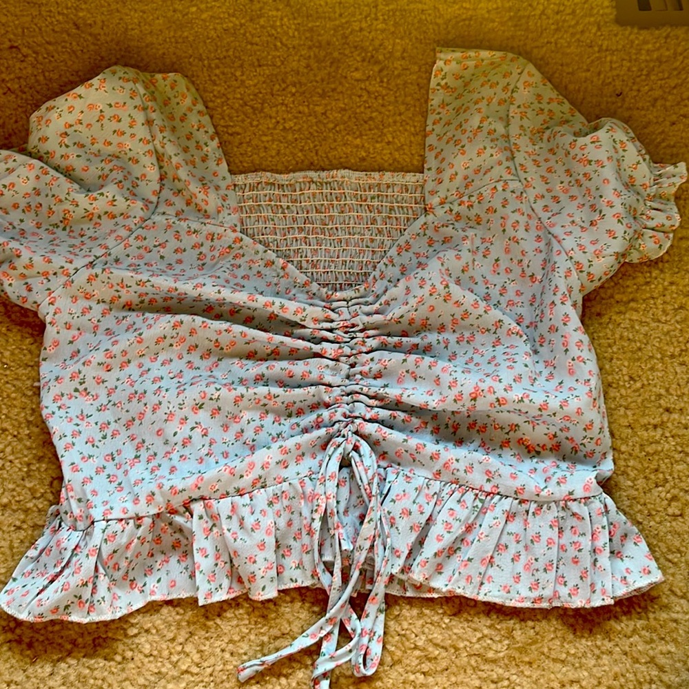 Puff sleeved light blue floral ruffle top